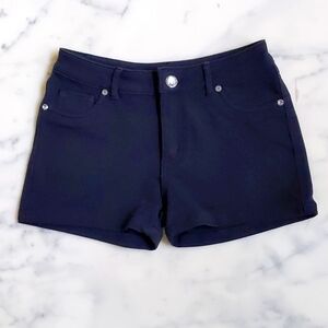 NWOT. Erti Couture Stretchable Short Black Shorts with Large Crystal Buttons.